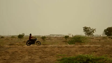 4K Man Riding Motorcycle Stock Footage 141670143