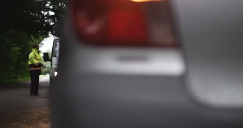 4k, Man shaking hands with a roadside mechanic as she arrives with a tow truck. Stock Footage 68368065