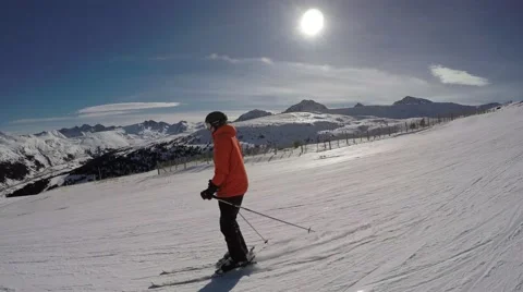 4k man skiing ski snow slope resort holiday sport winter empty powder following Stock Footage 57312792