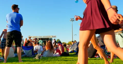 4K Man Stands in Crowd at Live Music Festival Stock Footage 57720324