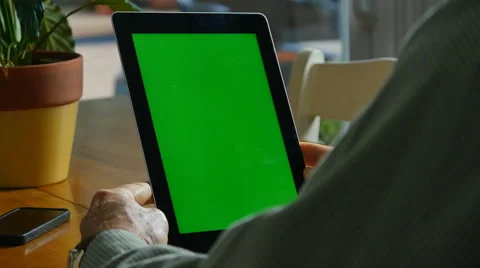 4K MAN WITH TABLET COMPUTER WITH GREEN SCREEN Stock Footage 45203347