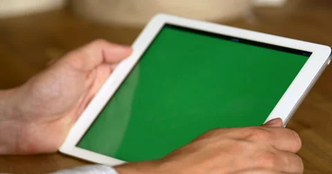 4K Man Using Tablet Computer Green chroma-key Screen Swiping Close-Up Stock Footage 51055035