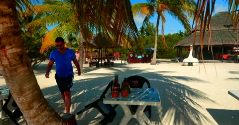 4K Man Walking Towards Camera, Tropical Island, Palm Trees Stock Footage 46832343