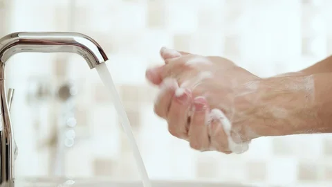 4K - Man washes hands. Close-up Stock Footage 128547231