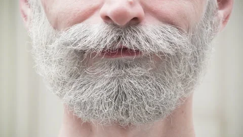 4K - A man with a white beard smiles Video stock 168615845