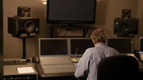 4K MAN WORKING IN TV AUDIO SUITE Stock Footage 58952582
