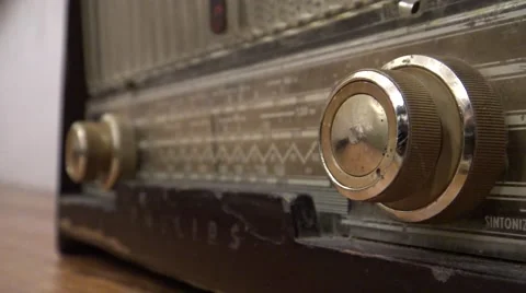 4k, A man’s hand turns the dial on an old radio -Dan Stock Footage 61007292