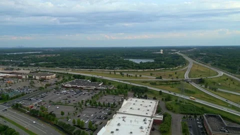 4K Maple Grove, MN Highway Traffic Aerial Pan 94 and 494 Stock Footage 220407399