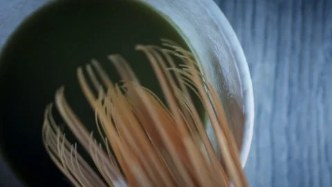 4k Matcha Tea Composition Close-up of Stirring Whisk Stock Footage 76779694