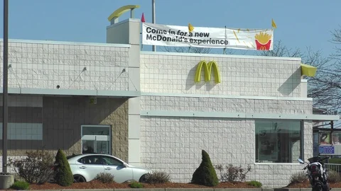 4K McDonald's drive thru window employee wears corona virus mask Stock-Footage 129200276