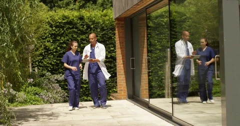 4K Medical workers having a serious disagreement about notes on a digital tablet Stock Footage 81109432