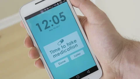 4K Medication Reminder App on Smartphone Screen Video stock 73575590