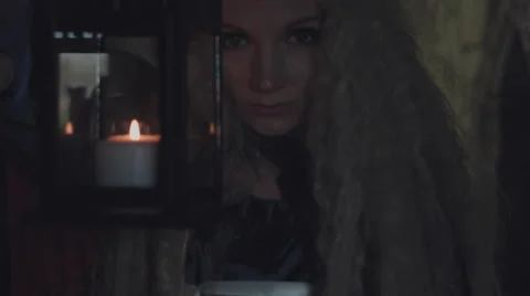 4k Medieval Shot of Game of Thrones Style Queen Walking in Castle with Candle Stock Footage