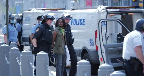 4K MEDIUM SHOT BLACK MAN ARRESTED Video stock 131456987