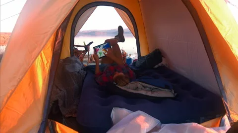 4k Medium shot of epic young traveler woman using a tablet to view a world map w Video stock 201095084