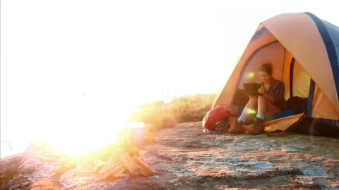 4k Medium shot of epic young traveler woman using a tablet whilst chilling in he Stock-Footage 201095314