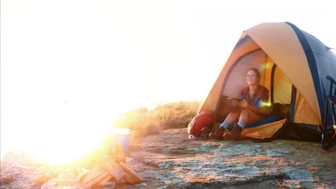 4k Medium shot of epic young traveler woman using a tablet whilst chilling in he Stock Footage 201095394