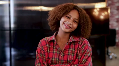 4K medium shot, multiethnic African high school student girl smiling to cam.. Stock Footage 246754968