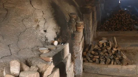 4k medium shot that Smoke is coming out of a porcelain kiln. Stock Footage 76539316