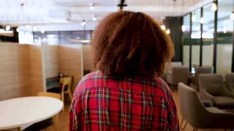 4K medium shot tracking view from behind of young student girl walking to l.. Stock-Footage 246754073