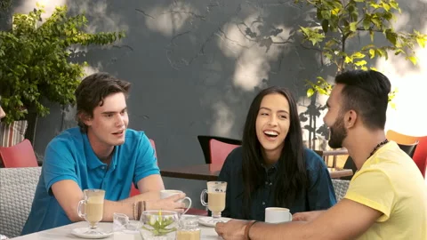 4k medium video multicultural group of young friends chatting and laughing toget Stock Footage 201095175