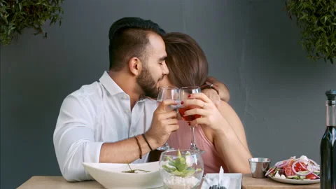 4k medium video of multiracial happy and romantic couple making a toast as its t Stock Footage 201096846