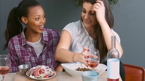 4k medium video of women, multicultural friends discussing their gourmet dishes Stock Footage 201095520