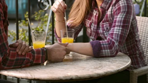 4k medium video of young multiracial happy and romantic couple holding hands on Stock Footage 201094661