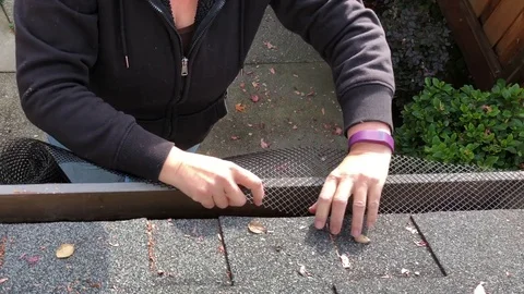 4K Mesh Gutter Guard installation Stock Footage 85110753
