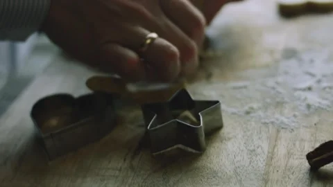 4K Metal Cookie Cutter Pressing into Rolled Gingerbread Dough Stock Footage 342113443