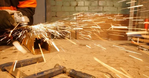 4K - Metalworking. Sparks fly to the camera Stock Footage 88713007