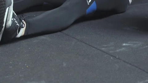 4K mid perspective shot of fit male shoulder pressing a barbell Stock Footage 77049536