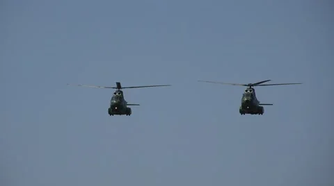 4K Military Helicopters Flying on Sky Stock Video Pond5