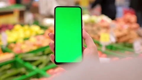 4k Mobile phone Chroma key for mobile app application. Close up of woman hand Stock Footage 233974955