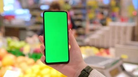 4k Mobile phone Chroma key for mobile app application. Close up of woman hand Video stock 235453241