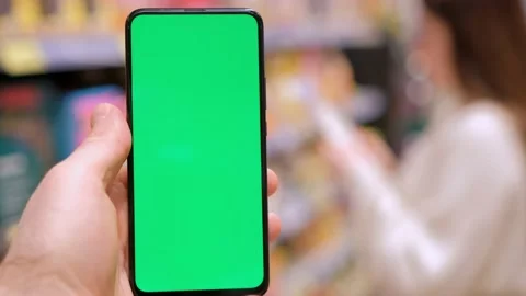 4k Mobile phone Chroma key for mobile app application. Close up of man hand Stock Footage 236456607