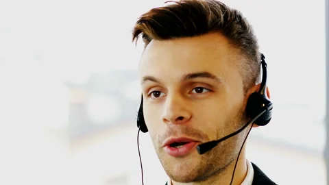   4K. Modern man operator in customer support service center. Face close up Stock-Footage 97642073