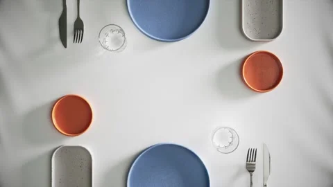 4K Modern Minimalist Dining Table Setting Colorful Ceramic Dinnerware Stock Footage 332157797