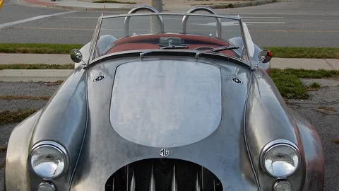 4K Modified Silver MG Convertible Exterior Tilt Up And Zoom Stock Footage 89520788