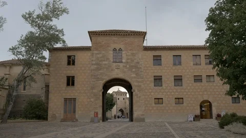 4K Monasterio Poblet exterior gate door passage stone Stock Footage 116539551