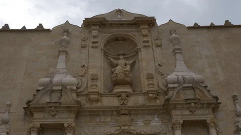 4K Monasterio Poblet exterior statues saints door gate low Stock Footage 116539639