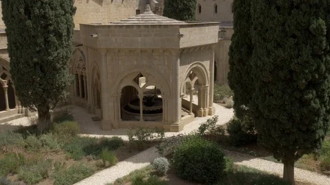 4K Monasterio Poblet exterior tower low sun noon shadow Stock Footage 116539746