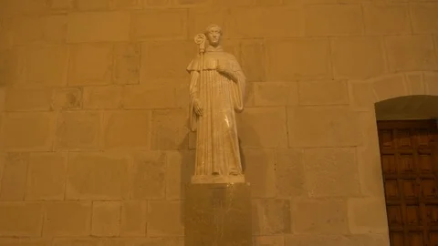 4K Monasterio Poblet interior museum statue saint monk Stock Footage 116540900