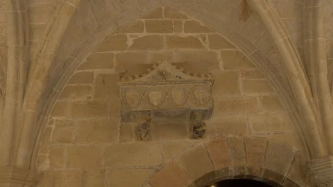 4K Monasterio Poblet tomb coffin tumba bones yard garden patio Stock Footage 116542211