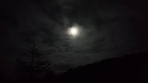 4K Moon Behind Dark Clouds in Night Sky 스톡 동영상 332803286