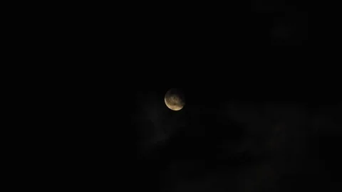 4k Moon in cloudy night sky close up video Stock Footage 93927213