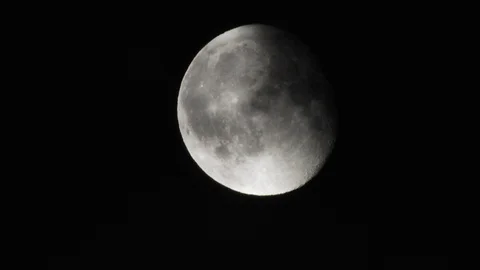 4k Moon in cloudy night sky close up video Stock Footage 93927368