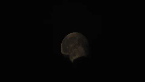 4k Moon in cloudy night sky close up video Stock Footage 93927661