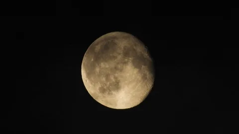 4k Moon in cloudy night sky close up video Stock Footage 93927768