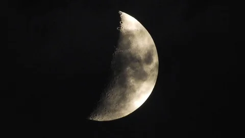 4k Moon in cloudy night sky close up video Stock Footage 93928142